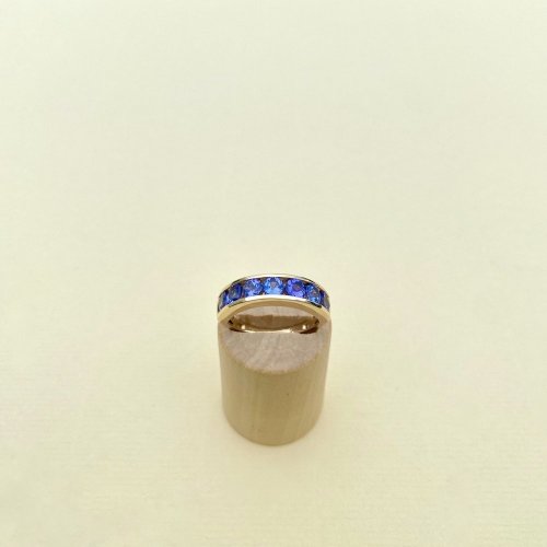 9ct. Gold Ring / Purple Gemstones.