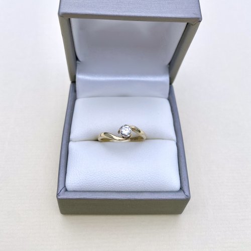 9ct. Gold Diamond Solitaire Ring.