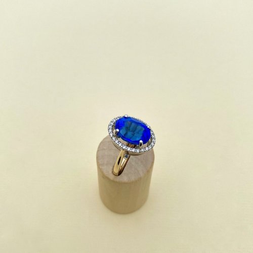 9ct. Oval Blue Gemstone &amp; Diamond Ring.