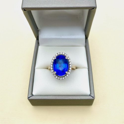 9ct. Oval Blue Gemstone &amp; Diamond Ring.