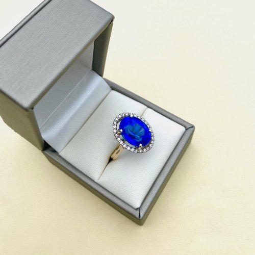 9ct. Oval Blue Gemstone &amp; Diamond Ring.