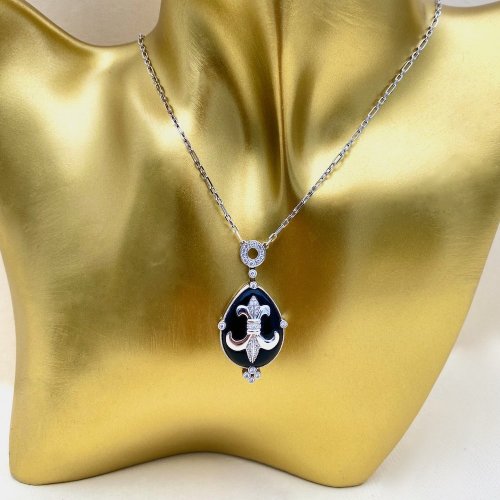 18ct. Gold Fleur de Lis Diamond &amp; Onyx Pendant.