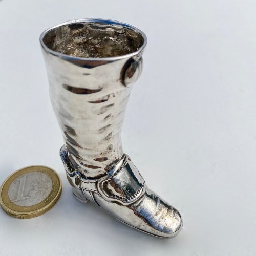 Miniature silver knee length boot. Dated 1903.