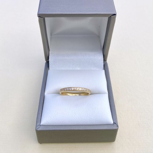 18ct. Gold Half Eternity Band set with Diamonds. 