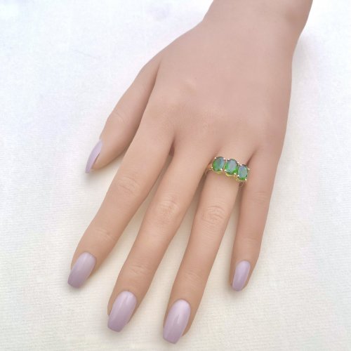 10ct. Gold Ring set with 3 Oval Green Gemstones.