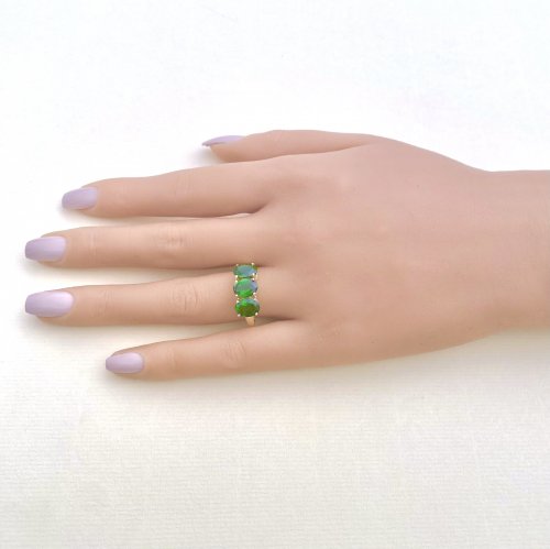 10ct. Gold Ring set with 3 Oval Green Gemstones.