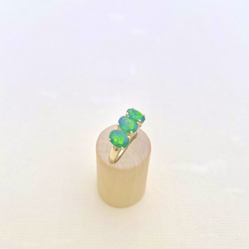 10ct. Gold Ring set with 3 Oval Green Gemstones.