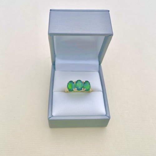 10ct. Gold Ring set with 3 Oval Green Gemstones.