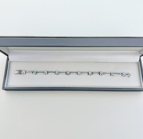 Silver Bracelet With Sparkling Floral Motifs. NEW STOCK.