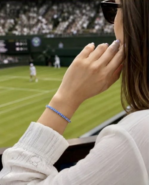 Silver Tennis Bracelet with Purple Gems. 
