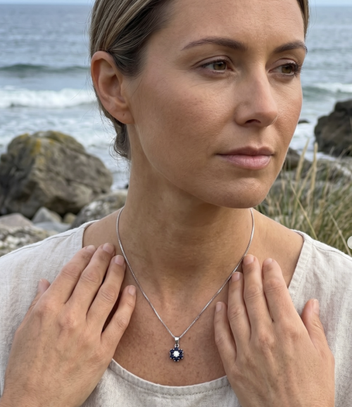 18ct. White Gold Sapphire &amp; Diamond Floral Design Pendant. 