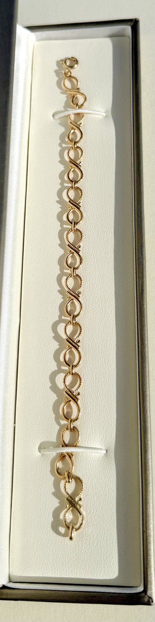 9ct. Gold Figure-of-Eight Eternity Bracelet. NEW STOCK.