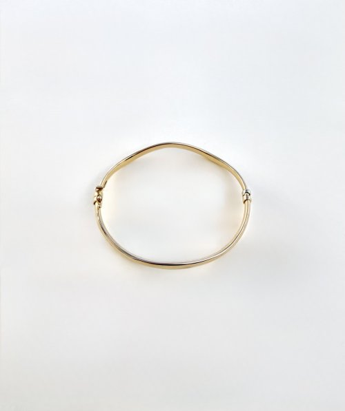 Contemporary 9ct. Yellow Gold Wave Bangle. NEW STOCK.