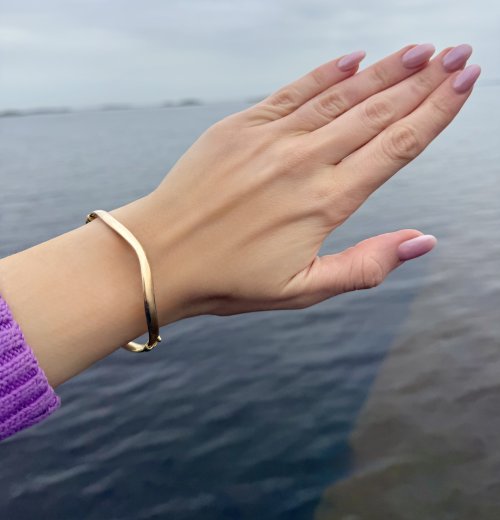 Contemporary 9ct. Yellow Gold Wave Bangle. NEW STOCK.