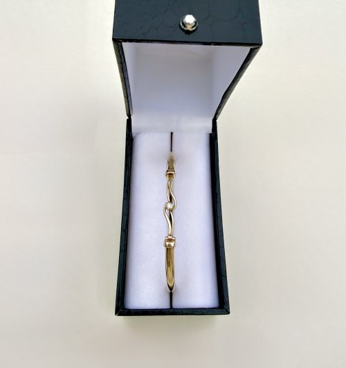 9ct. Yellow Gold Diamond Bangle with Curvilinear Design. NEW IN STOCK.