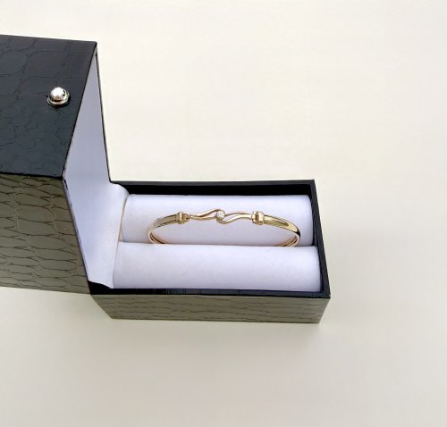 9ct. Yellow Gold Diamond Bangle with Curvilinear Design. NEW IN STOCK.