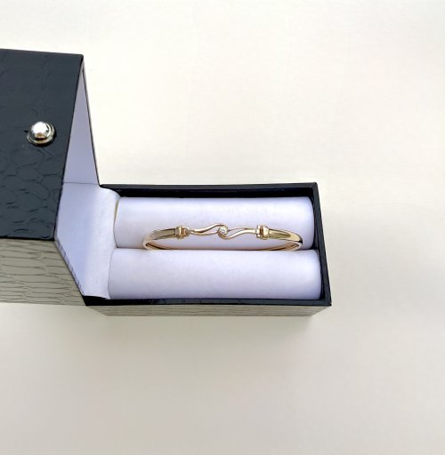 9ct. Yellow Gold Diamond Bangle with Curvilinear Design. NEW IN STOCK.