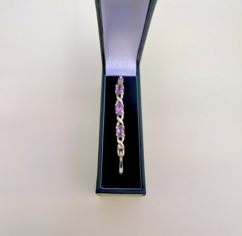 Sterling Silver Purple Gemstone Bangle with Figure-of-Eight Design. NEW IN STOCK.
