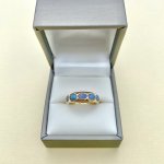 9ct. Gold 5-stone Opal Ring / &#039;Rubover&#039; Setting.