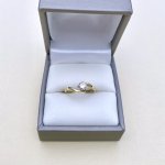 9ct. Gold Diamond Solitaire Ring.