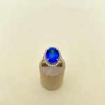 9ct. Oval Blue Gemstone &amp; Diamond Ring.