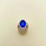 9ct. Oval Blue Gemstone &amp; Diamond Ring.