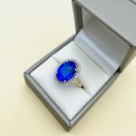 9ct. Oval Blue Gemstone &amp; Diamond Ring.