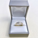 9ct. Gold Channel Set Half-Eternity Ring with 7 Diamonds.