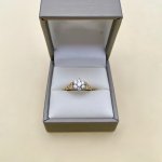 9ct. Solid Gold Daisy CZ Ring / Hearts to Shoulders.