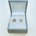 Sterling silver small stud earrings.