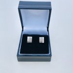 Sterling silver small stud earrings.