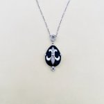 18ct. Gold Fleur de Lis Diamond &amp; Onyx Pendant.