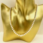 Necklace of graduated cultured pearls.