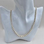 Necklace of graduated cultured pearls.