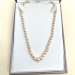 Necklace of graduated cultured pearls.