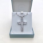 Hallmarked sterling silver crystal cross pendant.