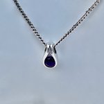 Silver / amethyst pendant.