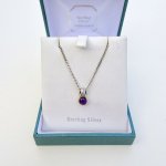 Silver / amethyst pendant.