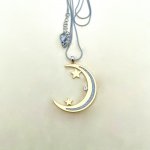 Crescent Shaped Pendant with Stars.