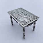 Miniature silver set table and chairs.