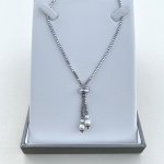 Silver Necklace Suspending Double Pearls.