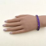 Silver Bracelet with Deep Purple Gemstones.