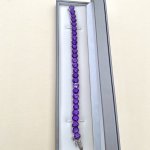 Silver Bracelet with Deep Purple Gemstones.