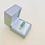 10ct. Gold Ring set with 3 Oval Green Gemstones.