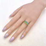 10ct. Gold Ring set with 3 Oval Green Gemstones.