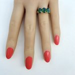 10ct. Gold Ring set with Three Grossular Garnets.