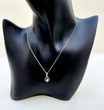 18ct. White Gold Sapphire &amp; Diamond Floral Design Pendant. 