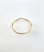 Contemporary 9ct. Yellow Gold Wave Bangle. NEW STOCK.