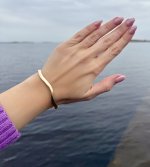 Contemporary 9ct. Yellow Gold Wave Bangle. NEW STOCK.