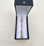 9ct. Yellow Gold Diamond Bangle with Curvilinear Design. NEW IN STOCK.